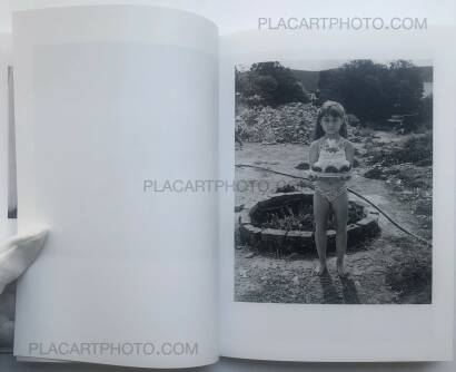 Jo Ractliffe,Two Men Arrive in a Village Jo Ractliffe,Two Men Arrive in a Village