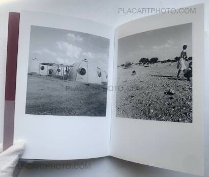 Jo Ractliffe,Two Men Arrive in a Village Jo Ractliffe,Two Men Arrive in a Village